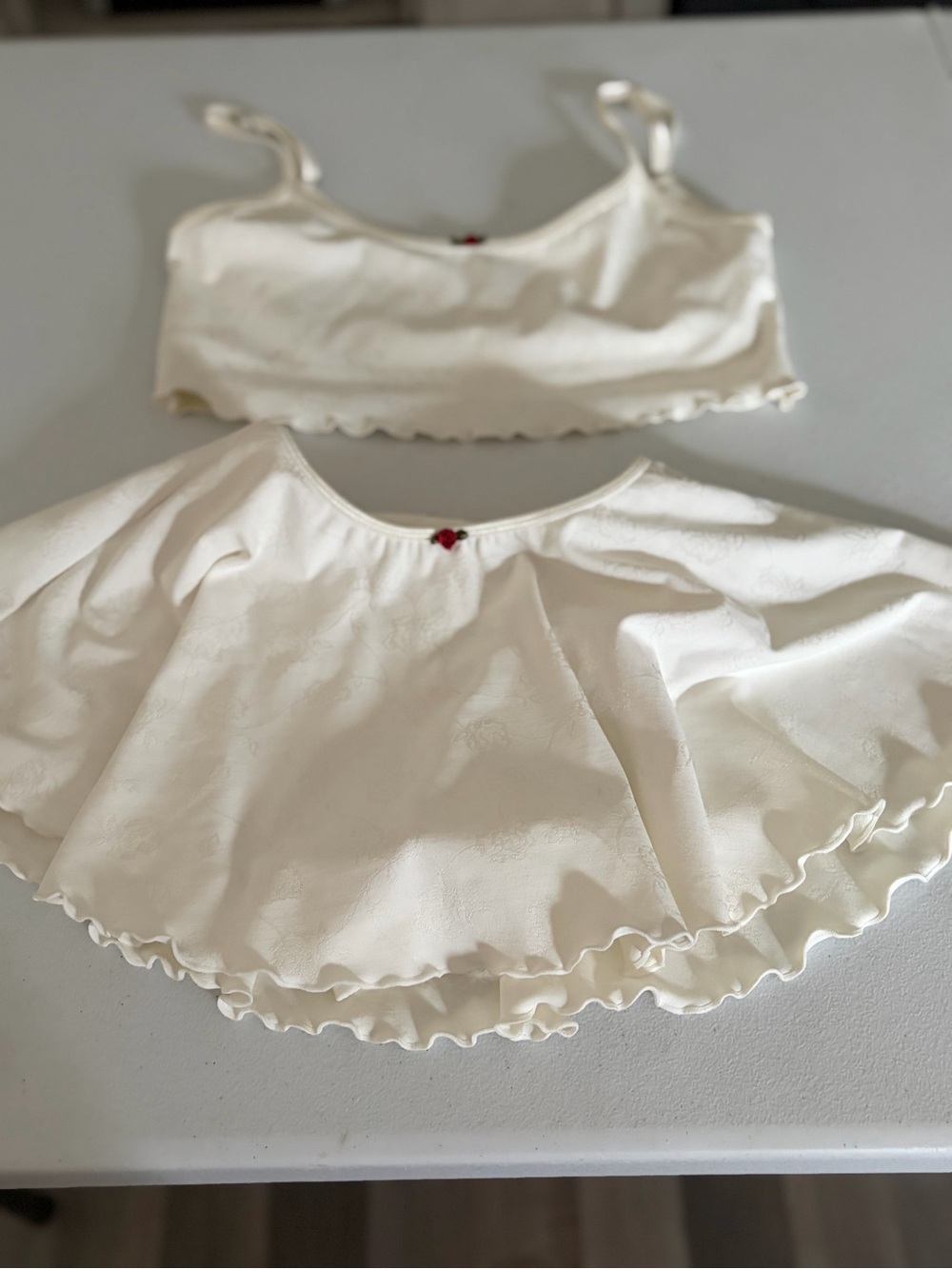 NWOT. Frankie’s Bikinis. Medium Top, Small Bottom Cream Ruffle Top and Bottom.